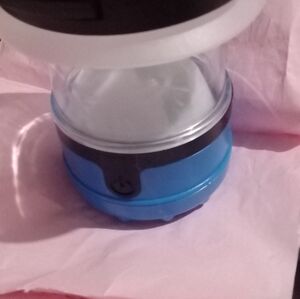 Dorcy blue camping lantern mini it uses batteries